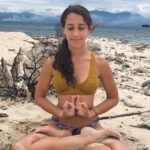 Yoga Sailing Retreat with Ana G Yoga instructor lotus and heart mudra