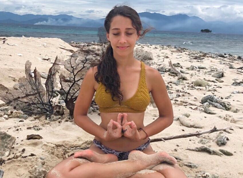 Yoga Sailing Retreat with Ana G Yoga instructor lotus and heart mudra
