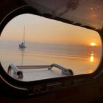 Yoga Sailing Retreat with yoga spot sunrise on anchor